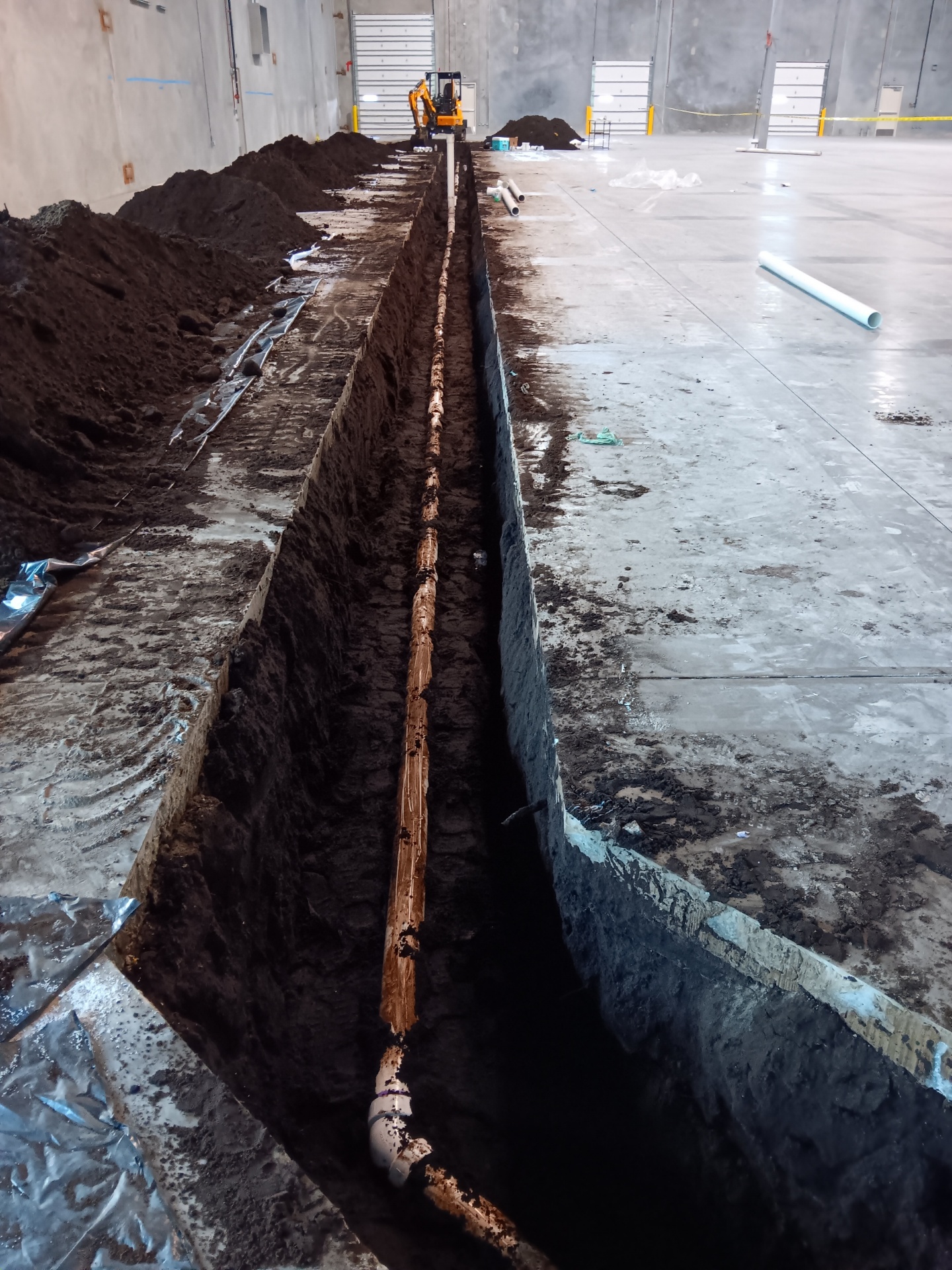 Bedded sanitary main — Interior trench · 180 LF